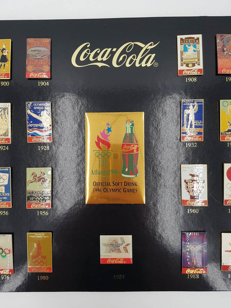 Pin's de collection Coca Cola "Jeux Olympiques 1996" encadrement en bois