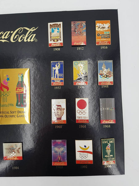 Pin's de collection Coca Cola "Jeux Olympiques 1996" encadrement en bois