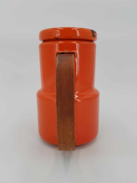 Ancienne cafetière émaillée de couleur orange