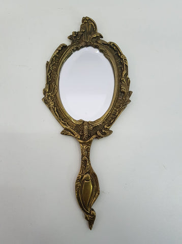 Miroir à main antique en bronze doré