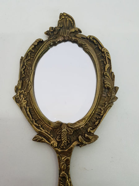 Miroir à main antique en bronze doré