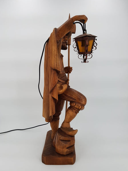 Grande sculpture "Le Veilleur de nuit" en bois massif avec lanterne lumineuse
