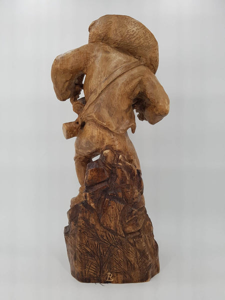 Grande sculpture de chasseur en bois par l'artiste René Lange (60cm)