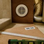 Vmc dans salle de bain : bouche d’extraction et conduit isolé en rénovation